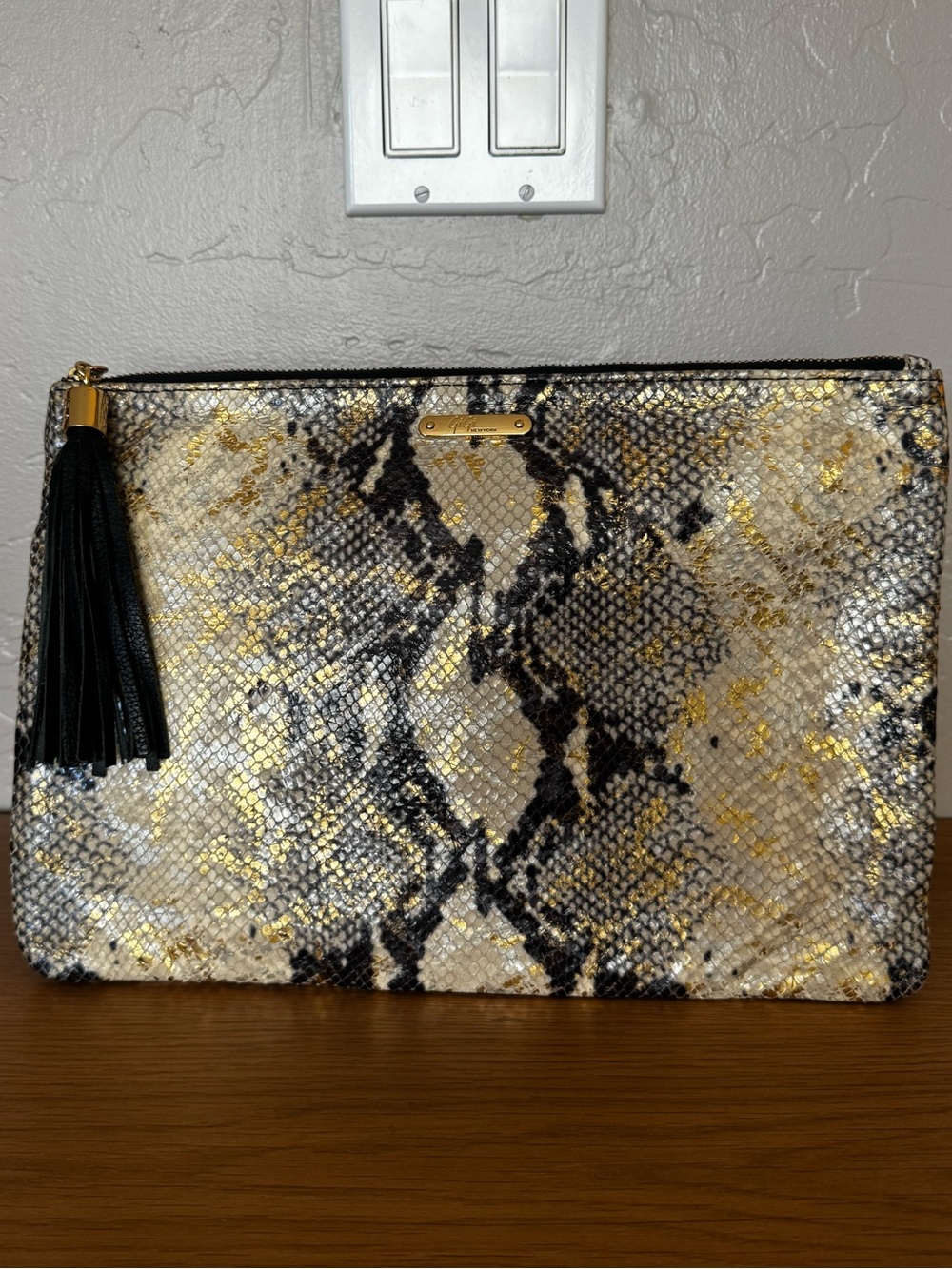 Gigi New York metallic snake Uber clutch